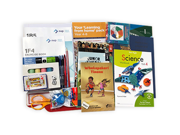 Photograph taken from above of the Year 4 hard pack. The pack contains various workbooks, exercise books and stationery.